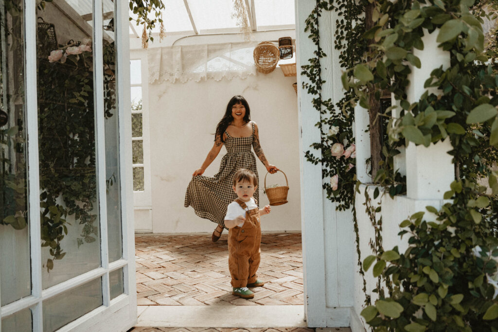 Close-up of a flowing cotton dress catching golden light, perfect outfit for a cinematic motherhood session.