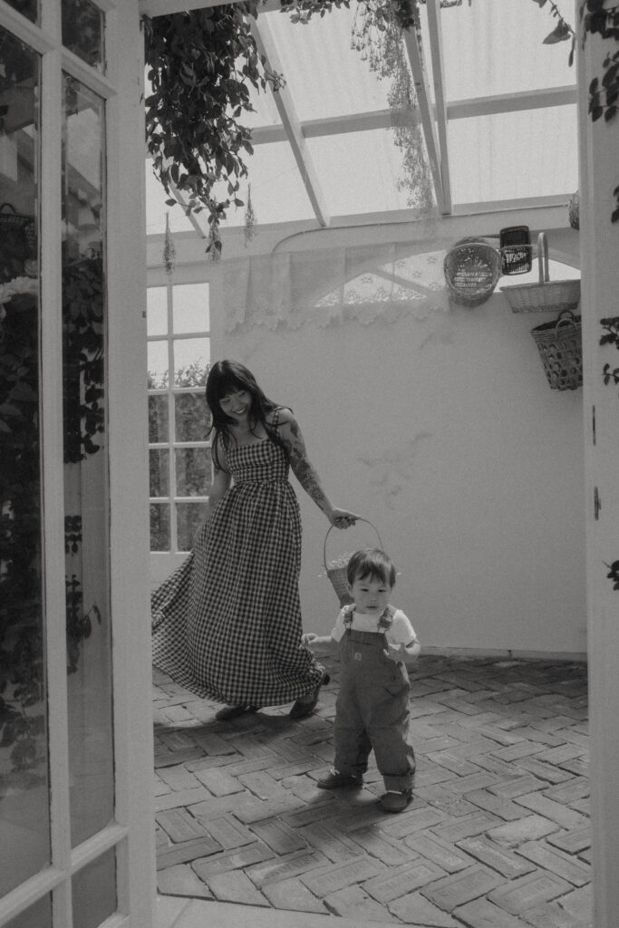 Close-up of a flowing cotton dress catching golden light, perfect outfit for a cinematic motherhood session.