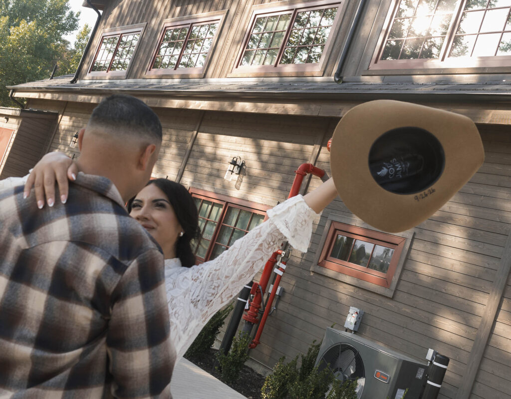 fiance dancing with groom to be in front of historic architecture