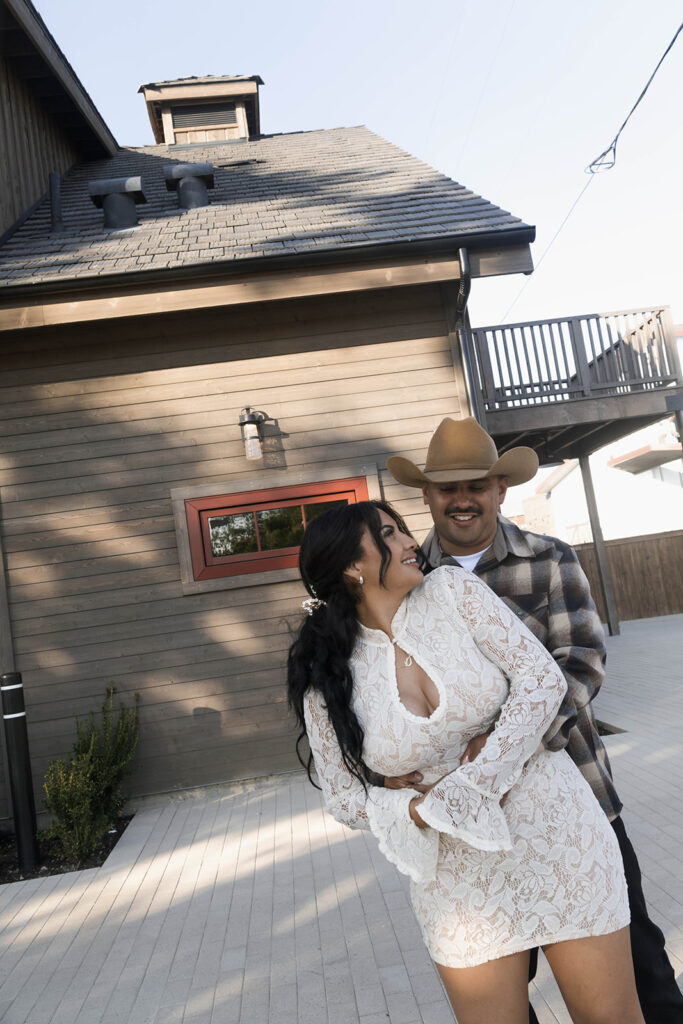 San Juan Capistrano engagement shoot future bride and groom taking western style engagment photos