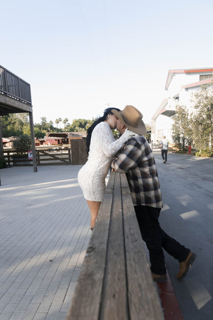 San Juan Capistrano engagement shoot future bride and groom taking western style engagment photos