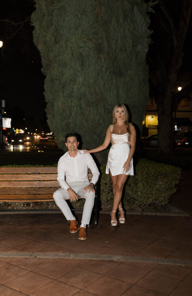 Historic Orange street reflections during a rainy engagement session with cinematic atmosphere