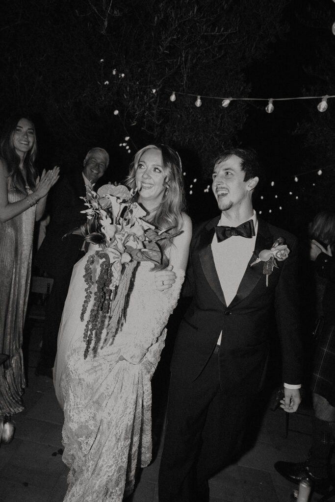 Bride and groom posing for wedding portraits.