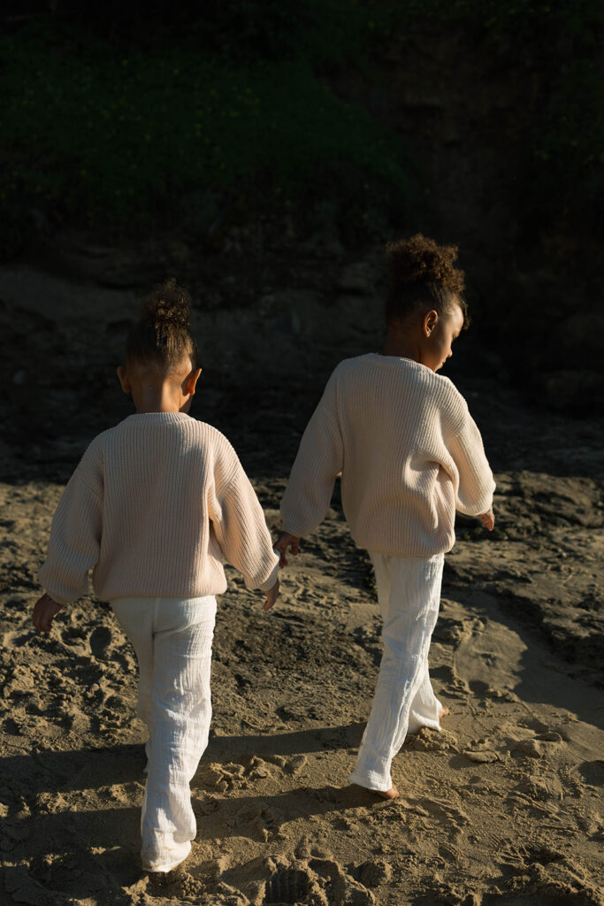 family photoshoot on the beach at sunset