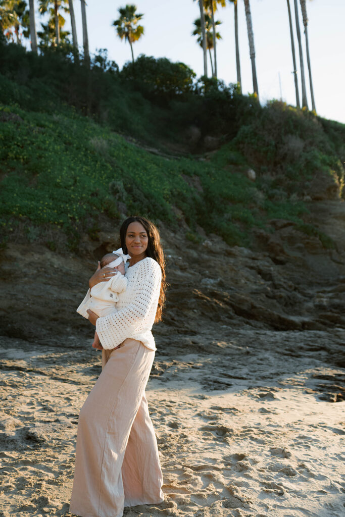 family photoshoot on the beach at sunset