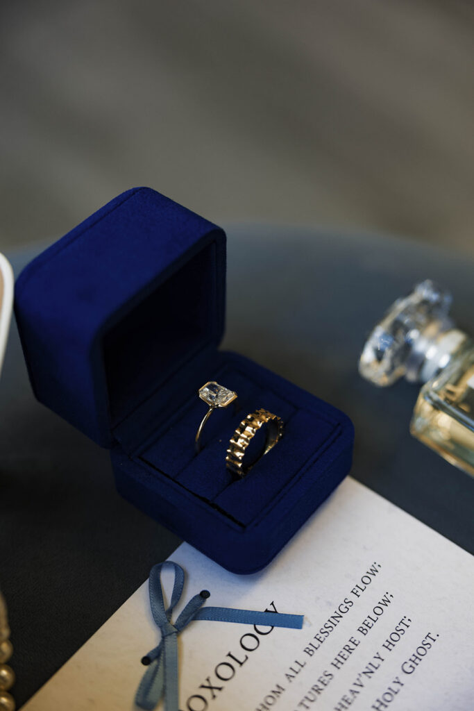 Romantic wedding scene featuring soft pastel florals, elegant decor, emotional couple moments, and guests celebrating in a light-filled venue inspired by Monet’s water lily paintings.