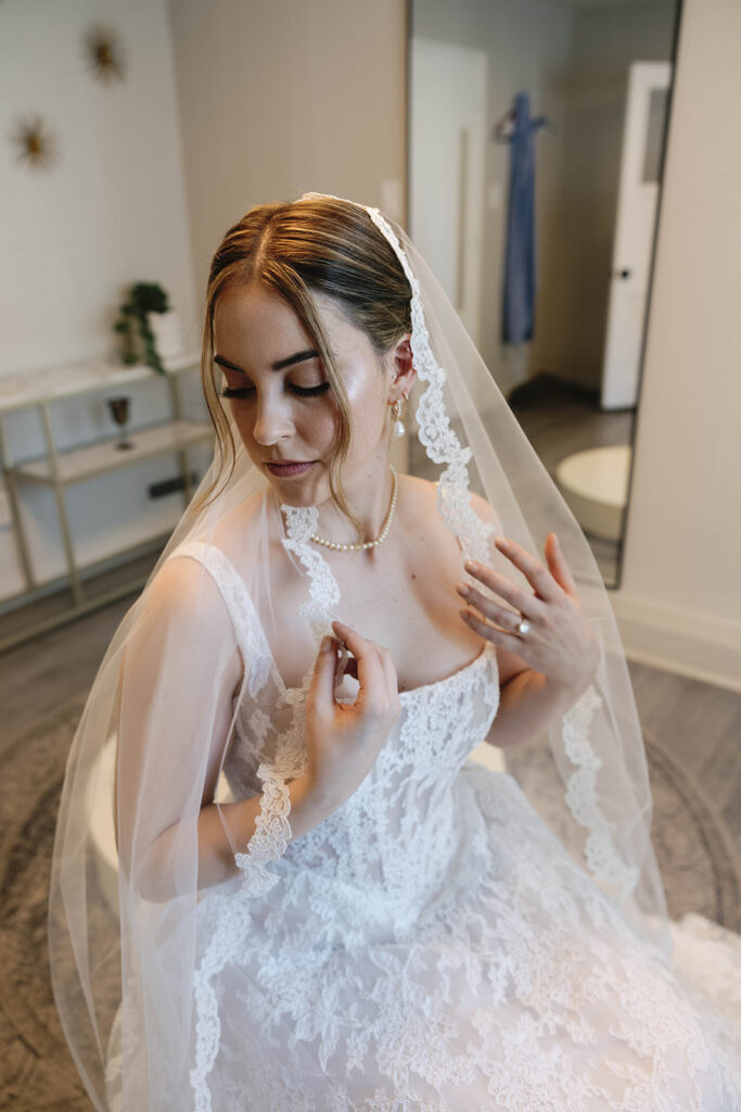 Romantic wedding scene featuring soft pastel florals, elegant decor, emotional couple moments, and guests celebrating in a light-filled venue inspired by Monet’s water lily paintings.