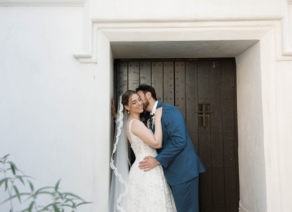 Romantic wedding scene featuring soft pastel florals, elegant decor, emotional couple moments, and guests celebrating in a light-filled venue inspired by Monet’s water lily paintings.