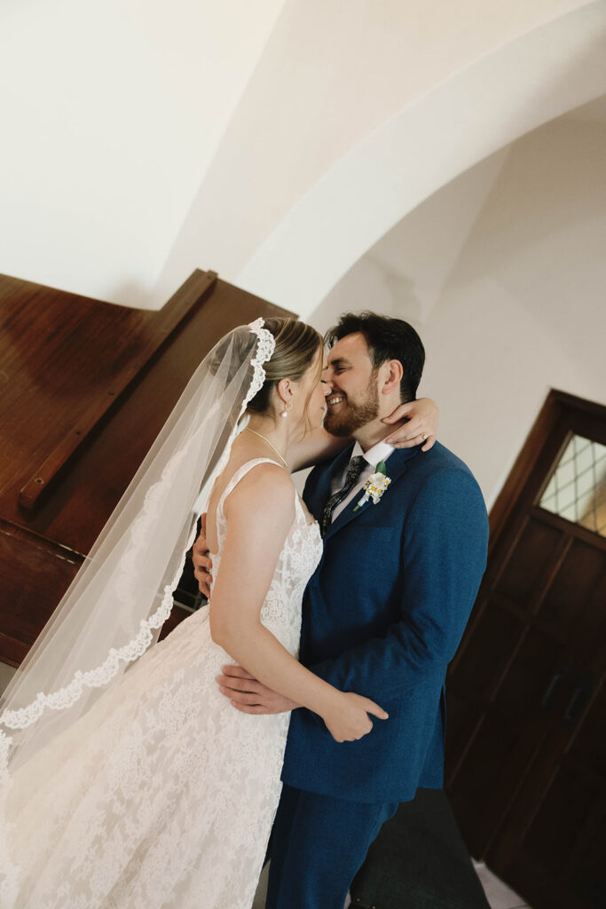 Romantic wedding scene featuring soft pastel florals, elegant decor, emotional couple moments, and guests celebrating in a light-filled venue inspired by Monet’s water lily paintings.