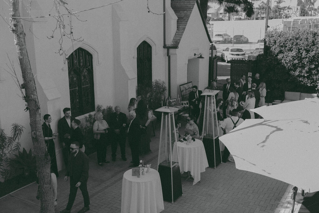 Romantic wedding scene featuring soft pastel florals, elegant decor, emotional couple moments, and guests celebrating in a light-filled venue inspired by Monet’s water lily paintings.