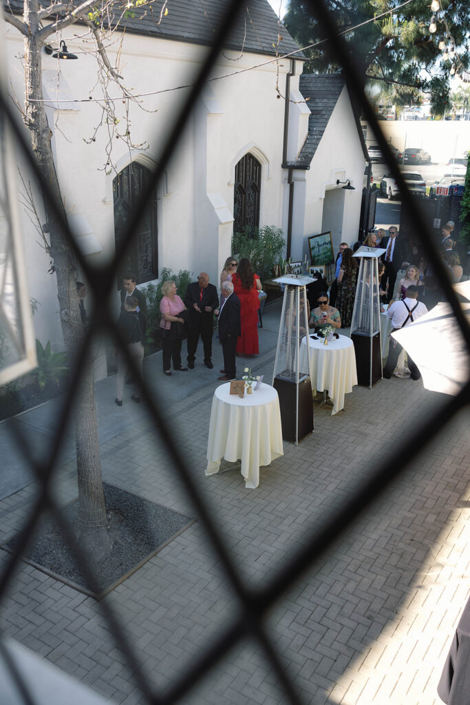 Romantic wedding scene featuring soft pastel florals, elegant decor, emotional couple moments, and guests celebrating in a light-filled venue inspired by Monet’s water lily paintings.