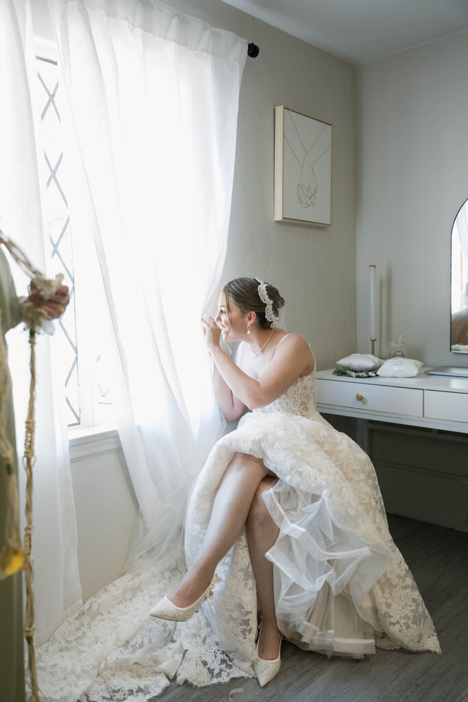 Romantic wedding scene featuring soft pastel florals, elegant decor, emotional couple moments, and guests celebrating in a light-filled venue inspired by Monet’s water lily paintings.