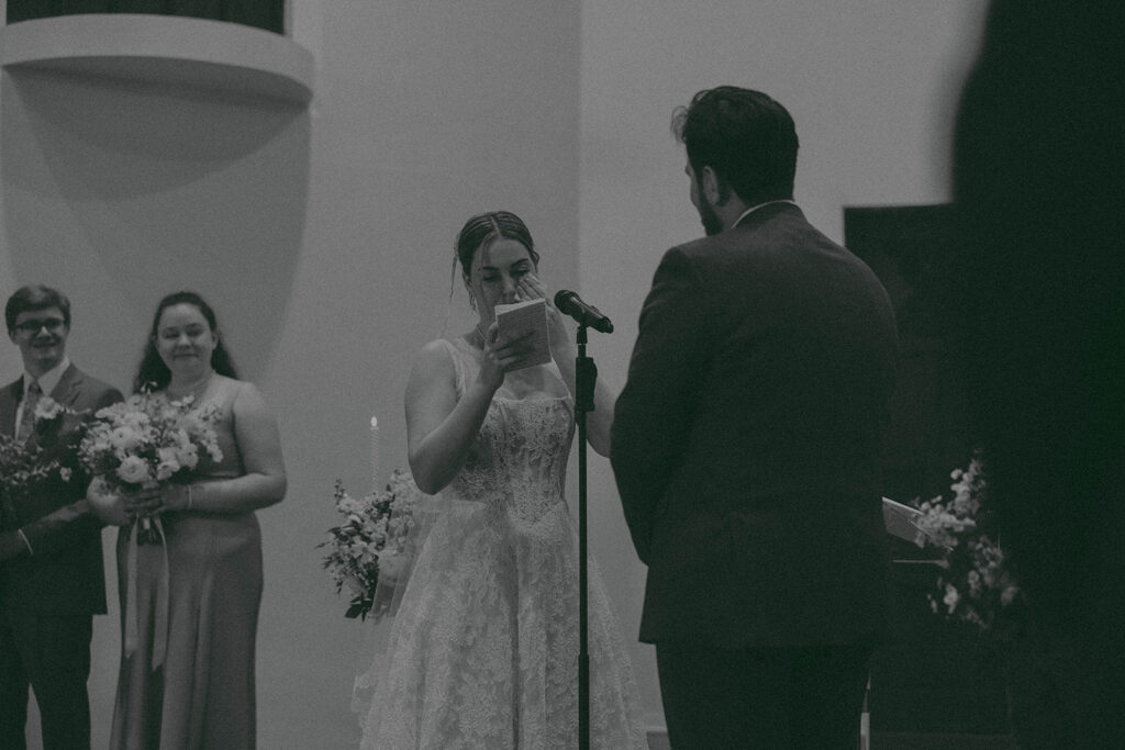 Romantic wedding scene featuring soft pastel florals, elegant decor, emotional couple moments, and guests celebrating in a light-filled venue inspired by Monet’s water lily paintings.