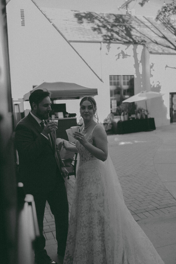 Romantic wedding scene featuring soft pastel florals, elegant decor, emotional couple moments, and guests celebrating in a light-filled venue inspired by Monet’s water lily paintings.