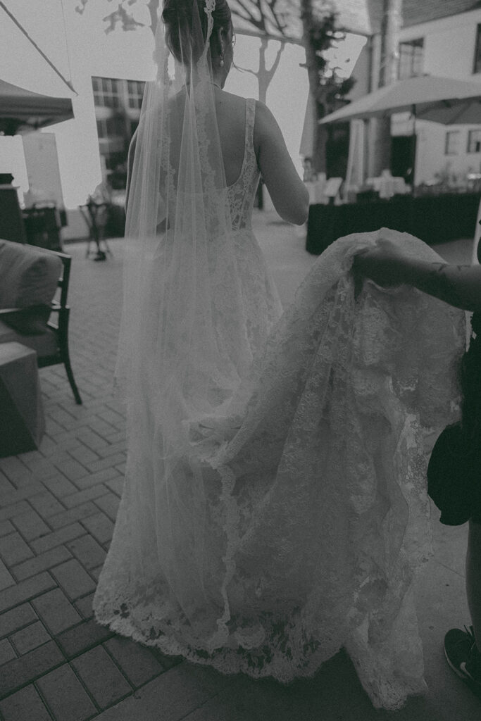 Romantic wedding scene featuring soft pastel florals, elegant decor, emotional couple moments, and guests celebrating in a light-filled venue inspired by Monet’s water lily paintings.