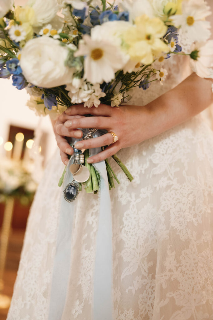 Romantic wedding scene featuring soft pastel florals, elegant decor, emotional couple moments, and guests celebrating in a light-filled venue inspired by Monet’s water lily paintings.