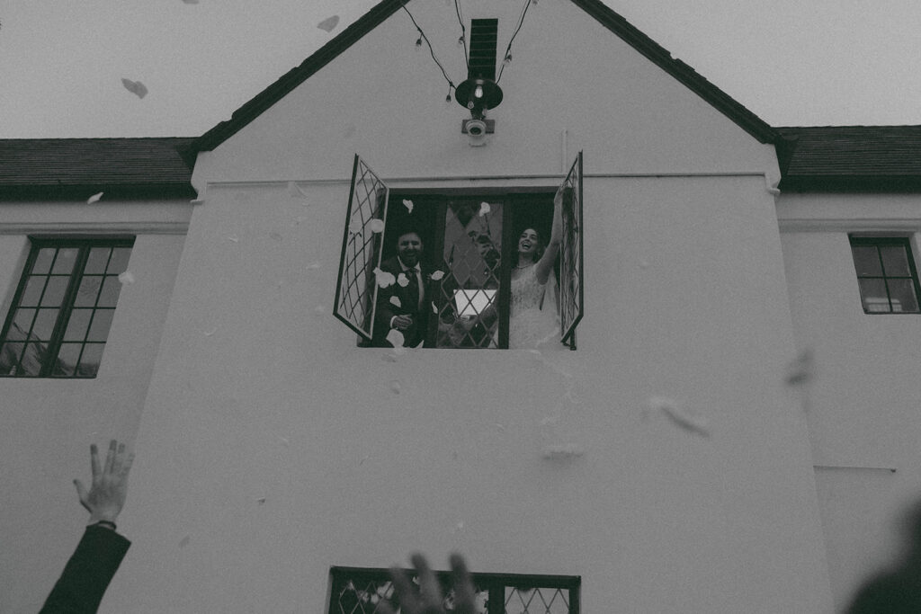 Romantic wedding scene featuring soft pastel florals, elegant decor, emotional couple moments, and guests celebrating in a light-filled venue inspired by Monet’s water lily paintings.