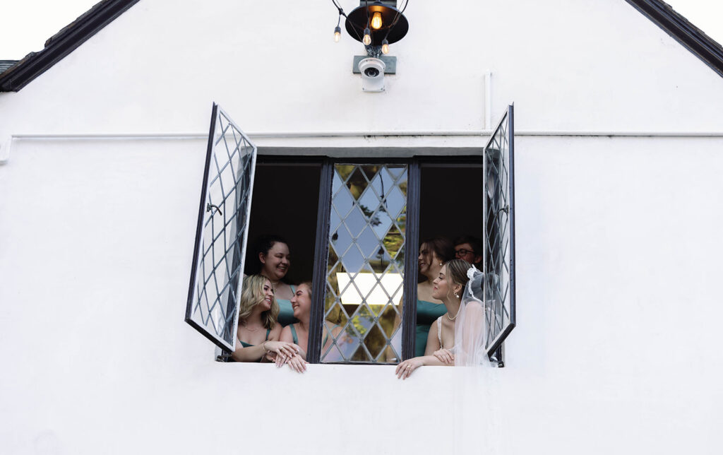 Romantic wedding scene featuring soft pastel florals, elegant decor, emotional couple moments, and guests celebrating in a light-filled venue inspired by Monet’s water lily paintings.