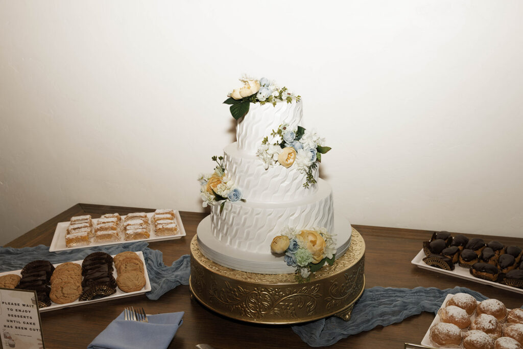 Romantic wedding scene featuring soft pastel florals, elegant decor, emotional couple moments, and guests celebrating in a light-filled venue inspired by Monet’s water lily paintings.