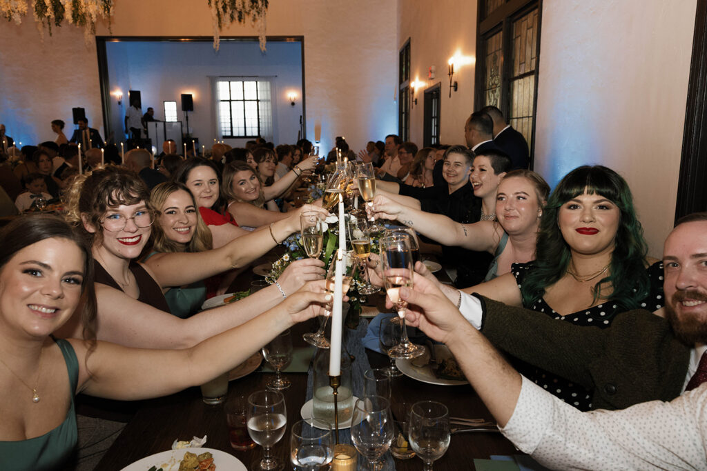 Romantic wedding scene featuring soft pastel florals, elegant decor, emotional couple moments, and guests celebrating in a light-filled venue inspired by Monet’s water lily paintings.
