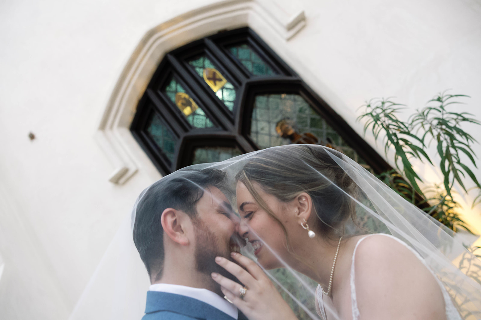 Romantic wedding scene featuring soft pastel florals, elegant decor, emotional couple moments, and guests celebrating in a light-filled venue inspired by Monet’s water lily paintings.