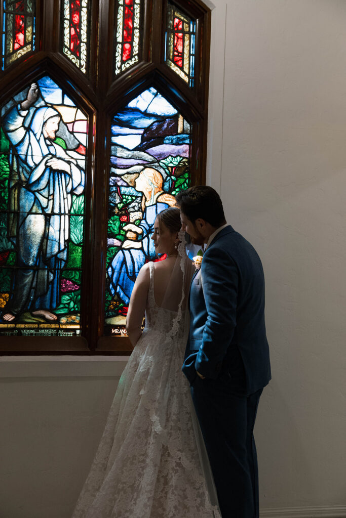 Romantic wedding scene featuring soft pastel florals, elegant decor, emotional couple moments, and guests celebrating in a light-filled venue inspired by Monet’s water lily paintings.