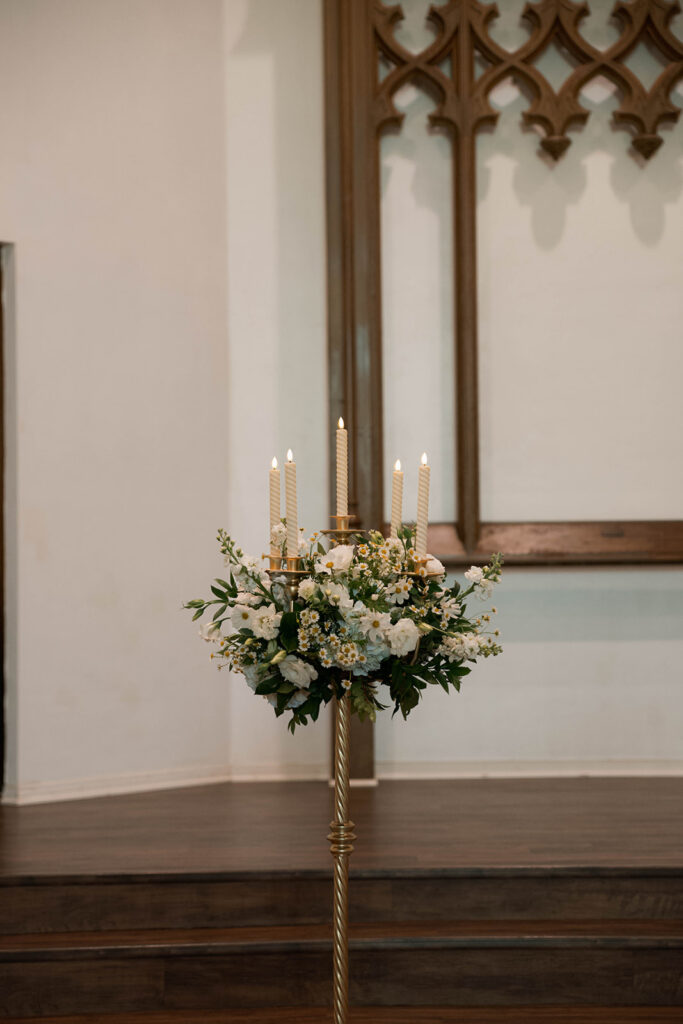 Romantic wedding scene featuring soft pastel florals, elegant decor, emotional couple moments, and guests celebrating in a light-filled venue inspired by Monet’s water lily paintings.