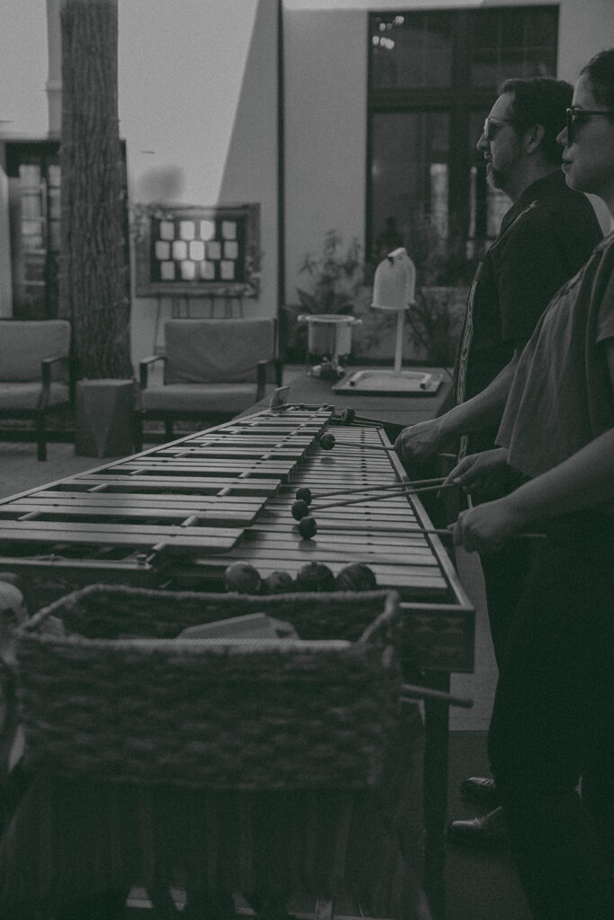 Romantic wedding scene featuring soft pastel florals, elegant decor, emotional couple moments, and guests celebrating in a light-filled venue inspired by Monet’s water lily paintings.