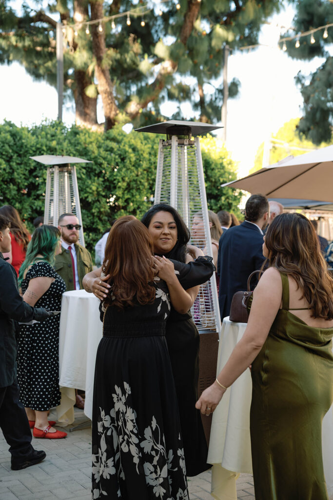 Romantic wedding scene featuring soft pastel florals, elegant decor, emotional couple moments, and guests celebrating in a light-filled venue inspired by Monet’s water lily paintings.