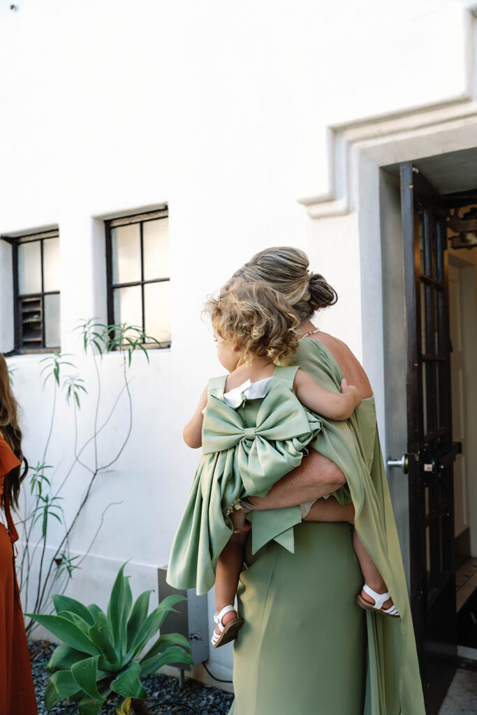 Romantic wedding scene featuring soft pastel florals, elegant decor, emotional couple moments, and guests celebrating in a light-filled venue inspired by Monet’s water lily paintings.