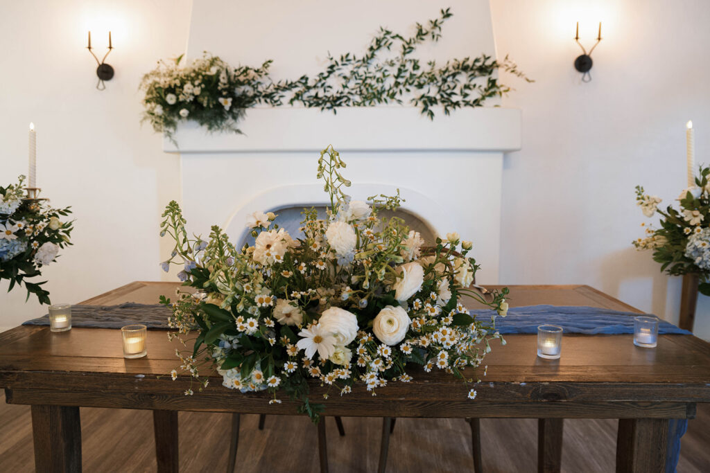 Romantic wedding scene featuring soft pastel florals, elegant decor, emotional couple moments, and guests celebrating in a light-filled venue inspired by Monet’s water lily paintings.