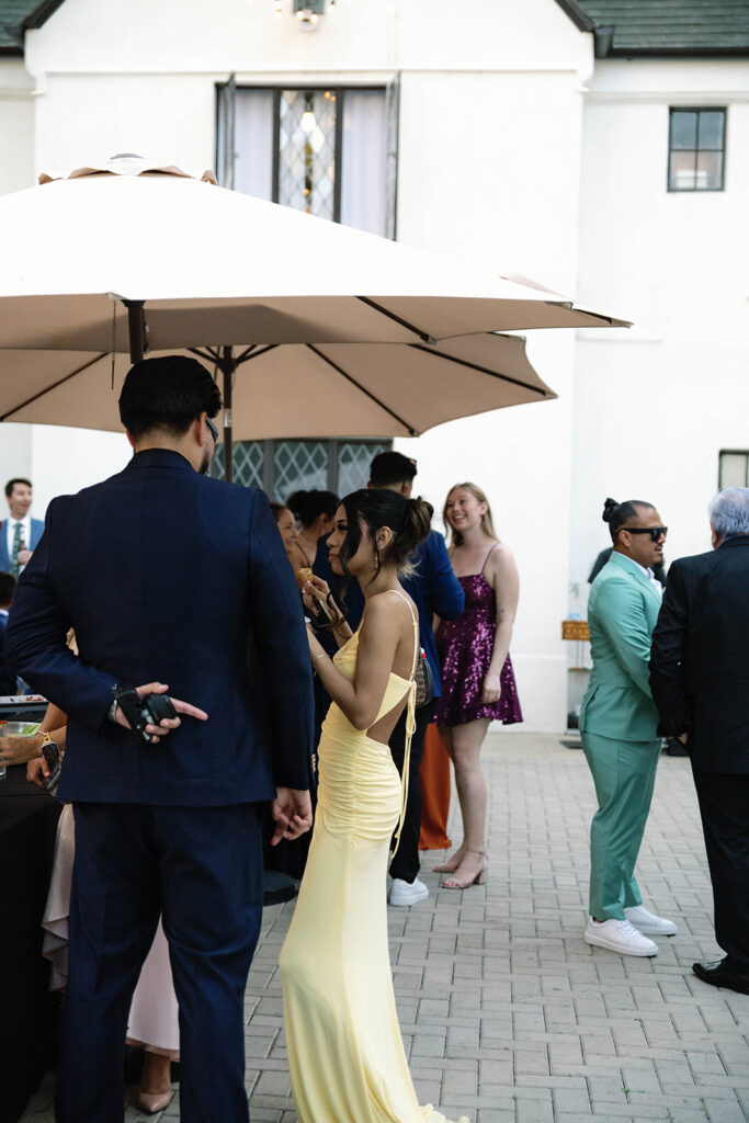 Romantic wedding scene featuring soft pastel florals, elegant decor, emotional couple moments, and guests celebrating in a light-filled venue inspired by Monet’s water lily paintings.