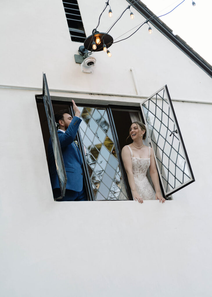 Romantic wedding scene featuring soft pastel florals, elegant decor, emotional couple moments, and guests celebrating in a light-filled venue inspired by Monet’s water lily paintings.