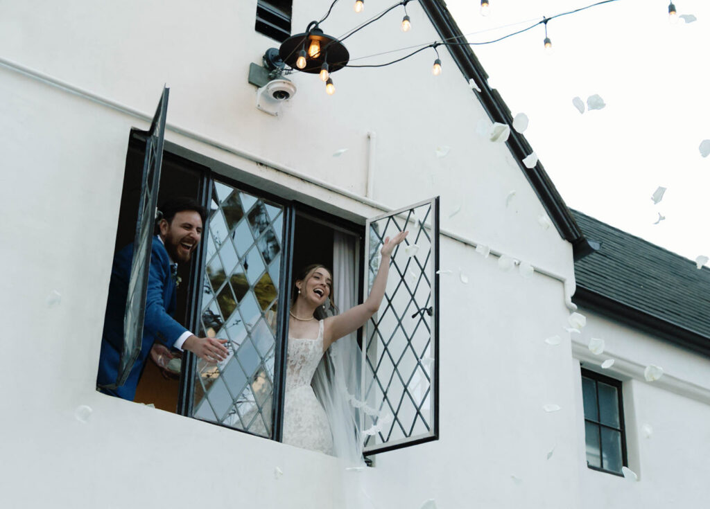 Romantic wedding scene featuring soft pastel florals, elegant decor, emotional couple moments, and guests celebrating in a light-filled venue inspired by Monet’s water lily paintings.