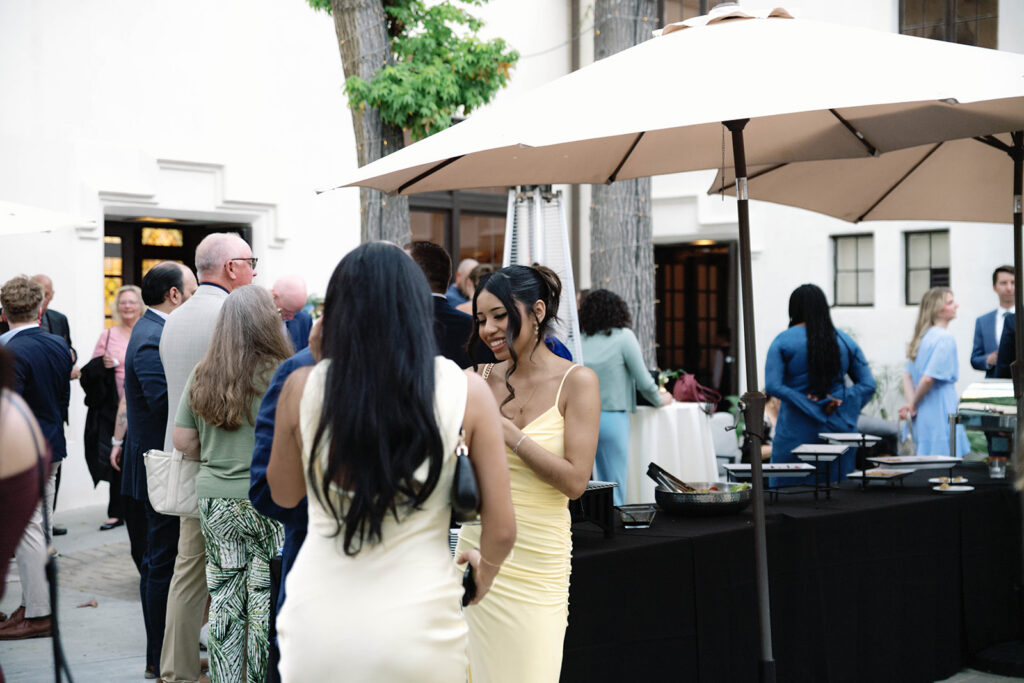 Romantic wedding scene featuring soft pastel florals, elegant decor, emotional couple moments, and guests celebrating in a light-filled venue inspired by Monet’s water lily paintings.